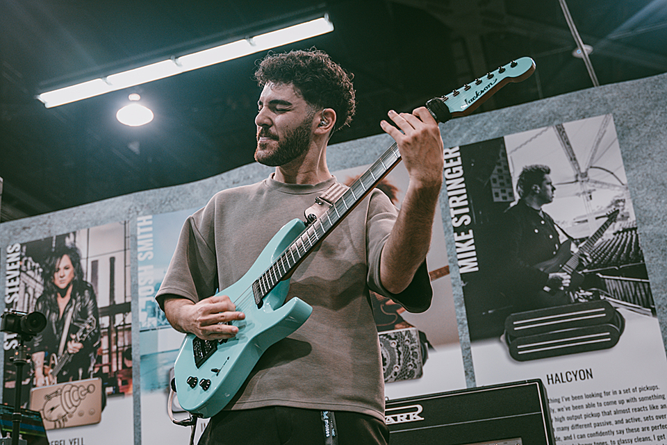 Keyan Houshmand was holding court at the Bare Knuckle booth, consitently cranking out cool content like he does, here with a Jackson Josh Smith Soloist SL7.