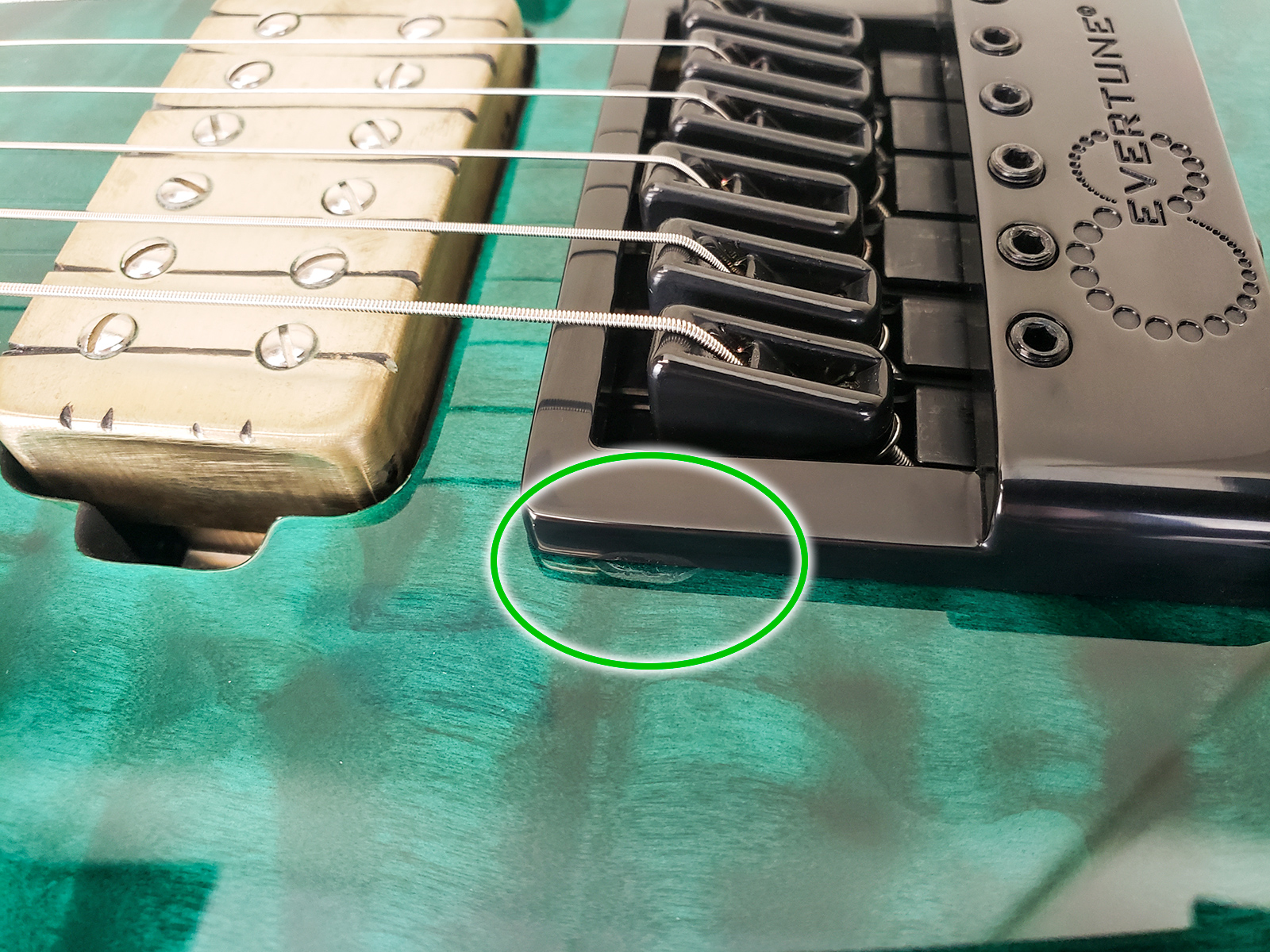 small chip under bridge faceplate - REPAIRED